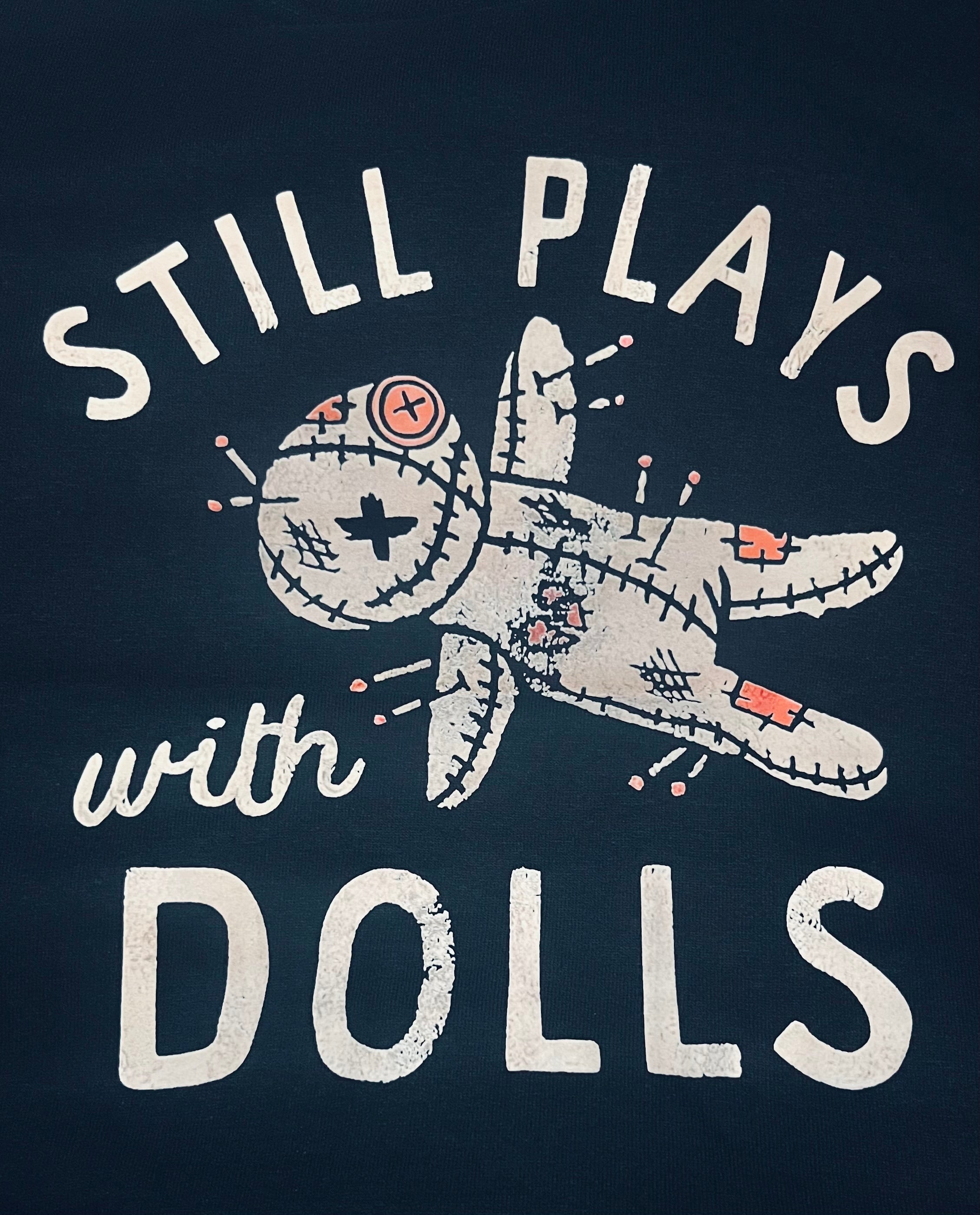 “Still Plays With Dolls” T-Shirt